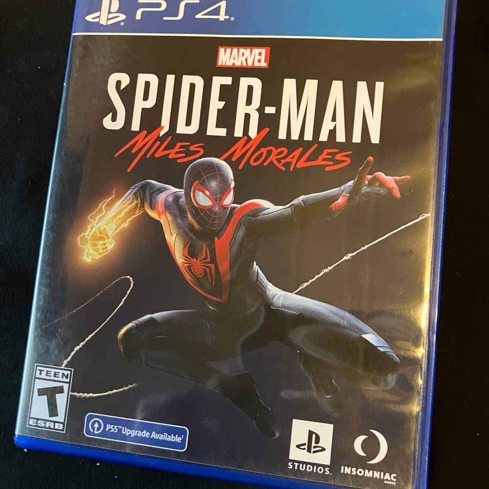 Spider-Man Miles Morales PS4/PS5 game (Like New) played once